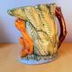 Zoomorphic pitcher in slipware, monkey.