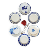Old mismatched earthenware dinner plates