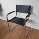 Pair of armchairs in chrome and black leather
