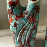 Vintage pair of turquoise and red ceramic candlesticks