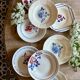Set of 8 mismatched vintage soup plates