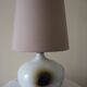 Glazed ceramic ball lamp signed Bossis with a fabric shade.