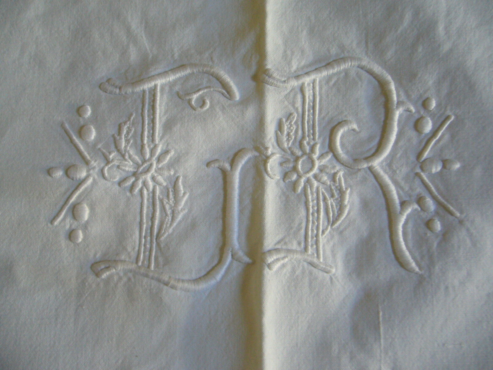 Ancient cotton sheet embroidered with flowers and initials