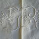 Ancient cotton sheet embroidered with flowers and initials
