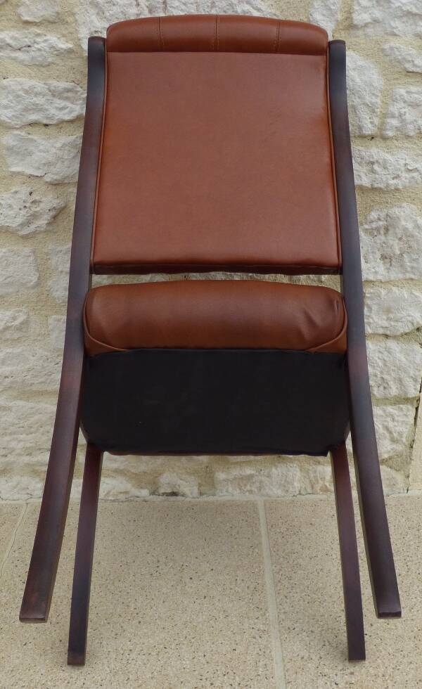 Chic Vintage Chesterfield style chair with wooden frame and faux leather