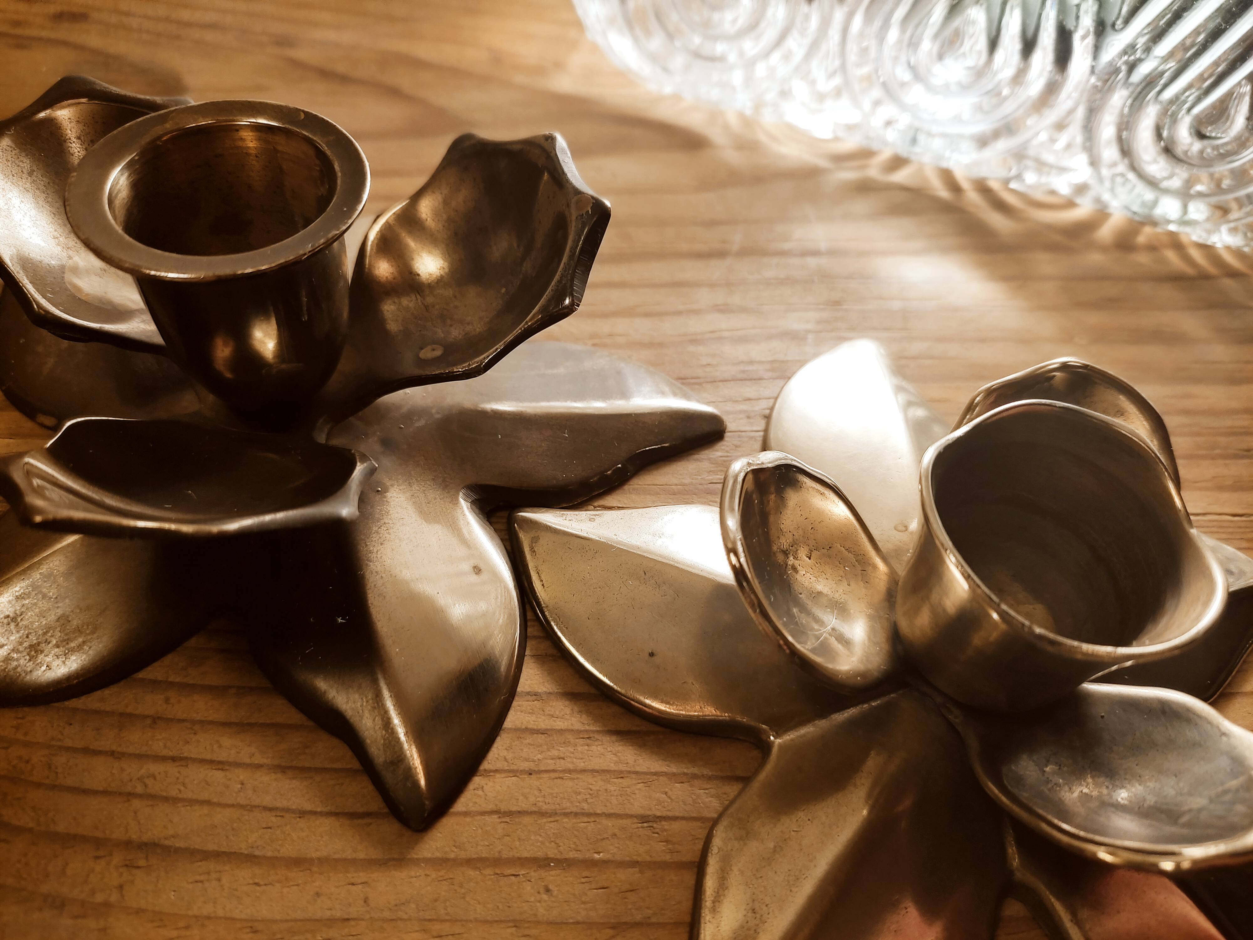 Duo of brass star candle holders