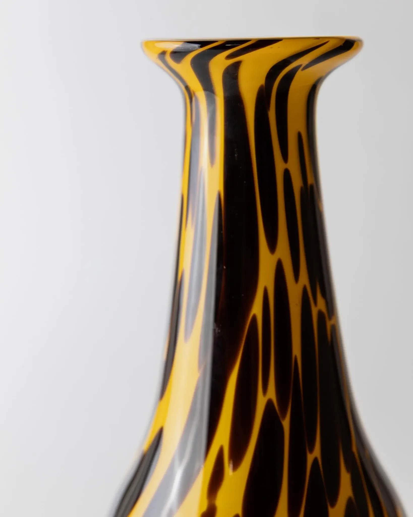 Vintage Murano glass vase from the 1990s, yellow art glass with black spots, postmodern Italian design.