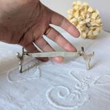 Set of 12 Christofle knife rests, Moderne 1912 model