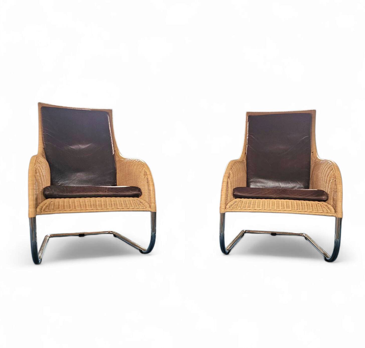 2 x Weighty rattan lounge chair / brown leather 1990s  Very good condition