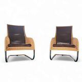 2 x Weighty rattan lounge chair / brown leather 1990s  Very good condition