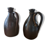 Dark brown stoneware jugs and pitchers with their cord