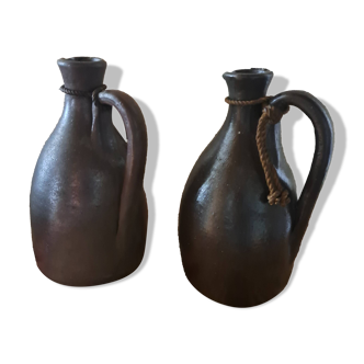 Dark brown stoneware jugs and pitchers with their cord