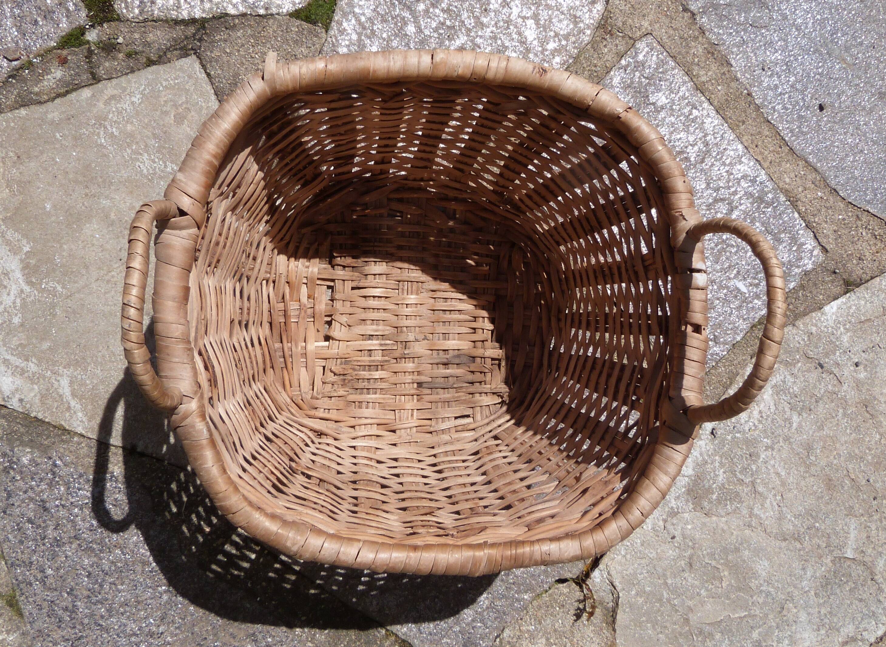Small wicker basket with handles