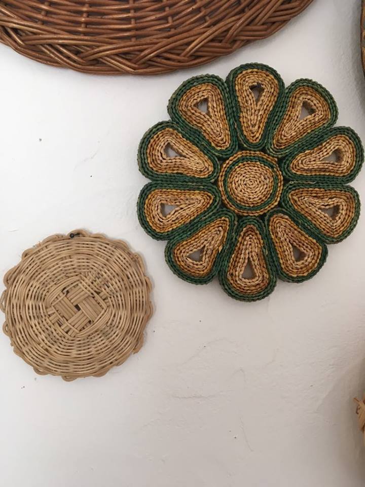 Wall composition of baskets and braided wicker trays