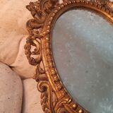 Italian mirror in gilded scupted wood