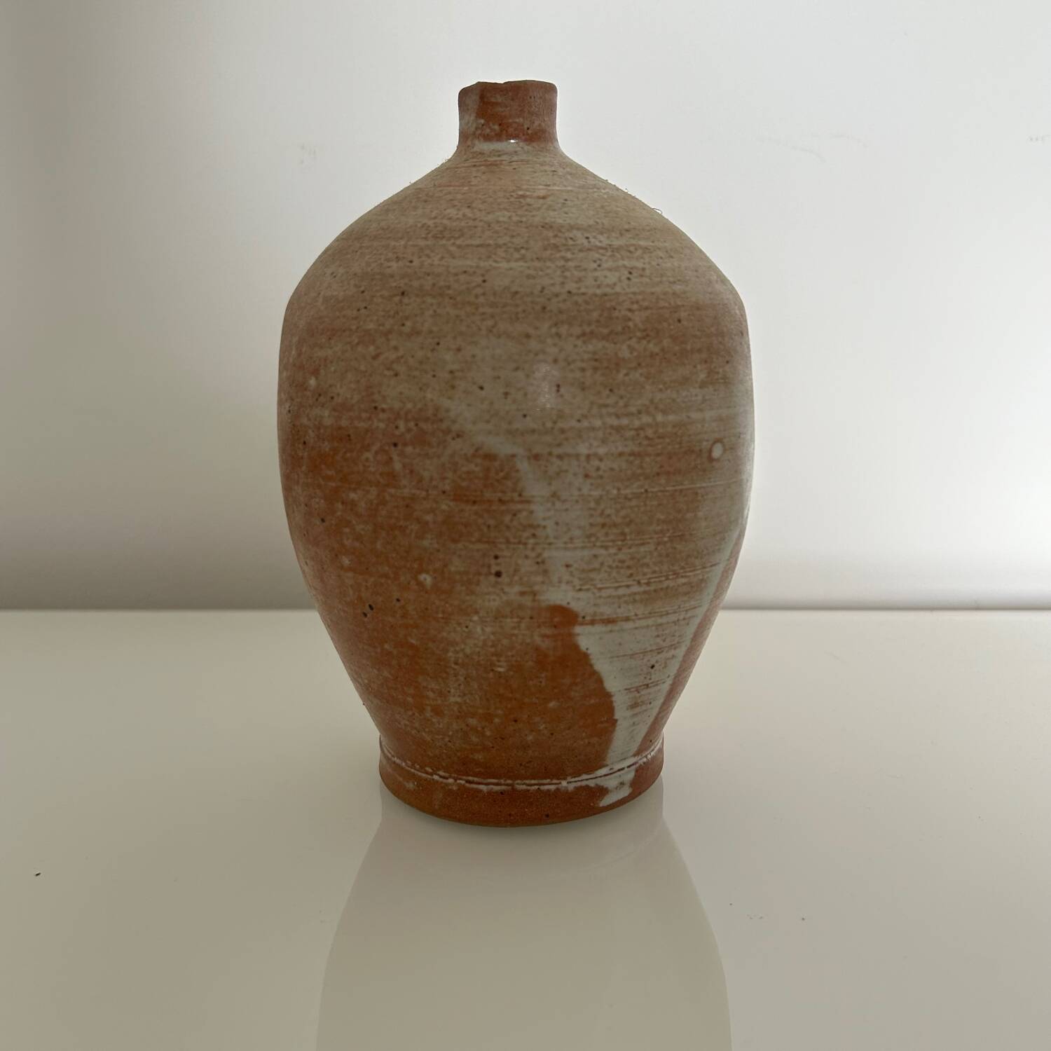 Patinated stoneware jug