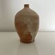Patinated stoneware jug