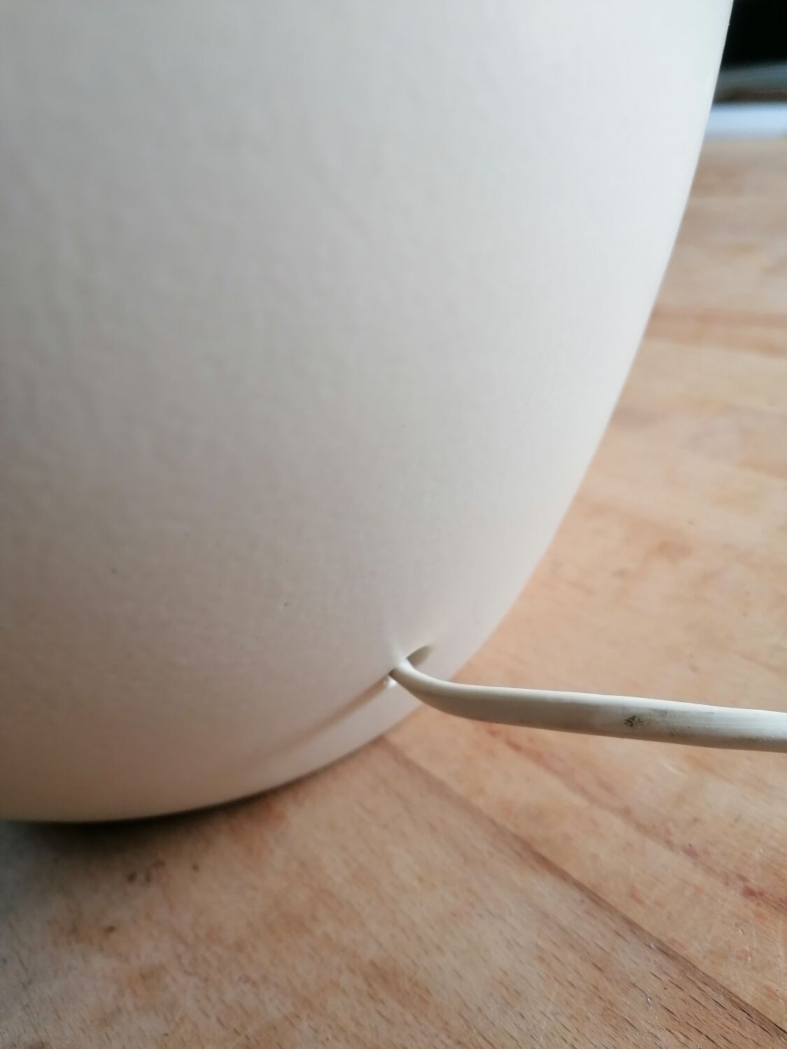 Vintage ceramic table lamp and golden lampshade.