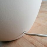 Vintage ceramic table lamp and golden lampshade.