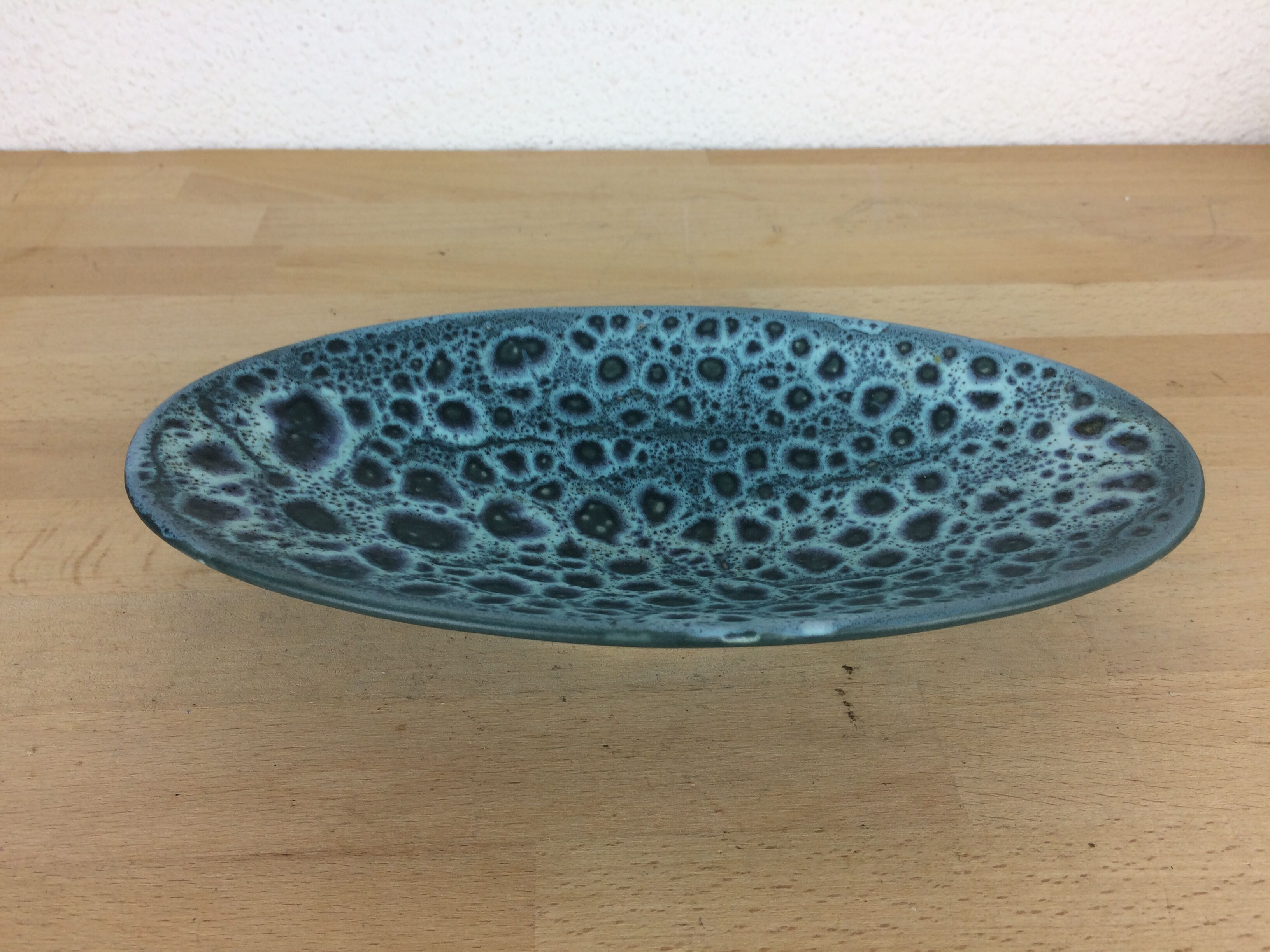 Empty vintage blue ceramic pocket