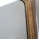 Golden Louis Philippe mirror H122xW84cm with gilded motifs.
