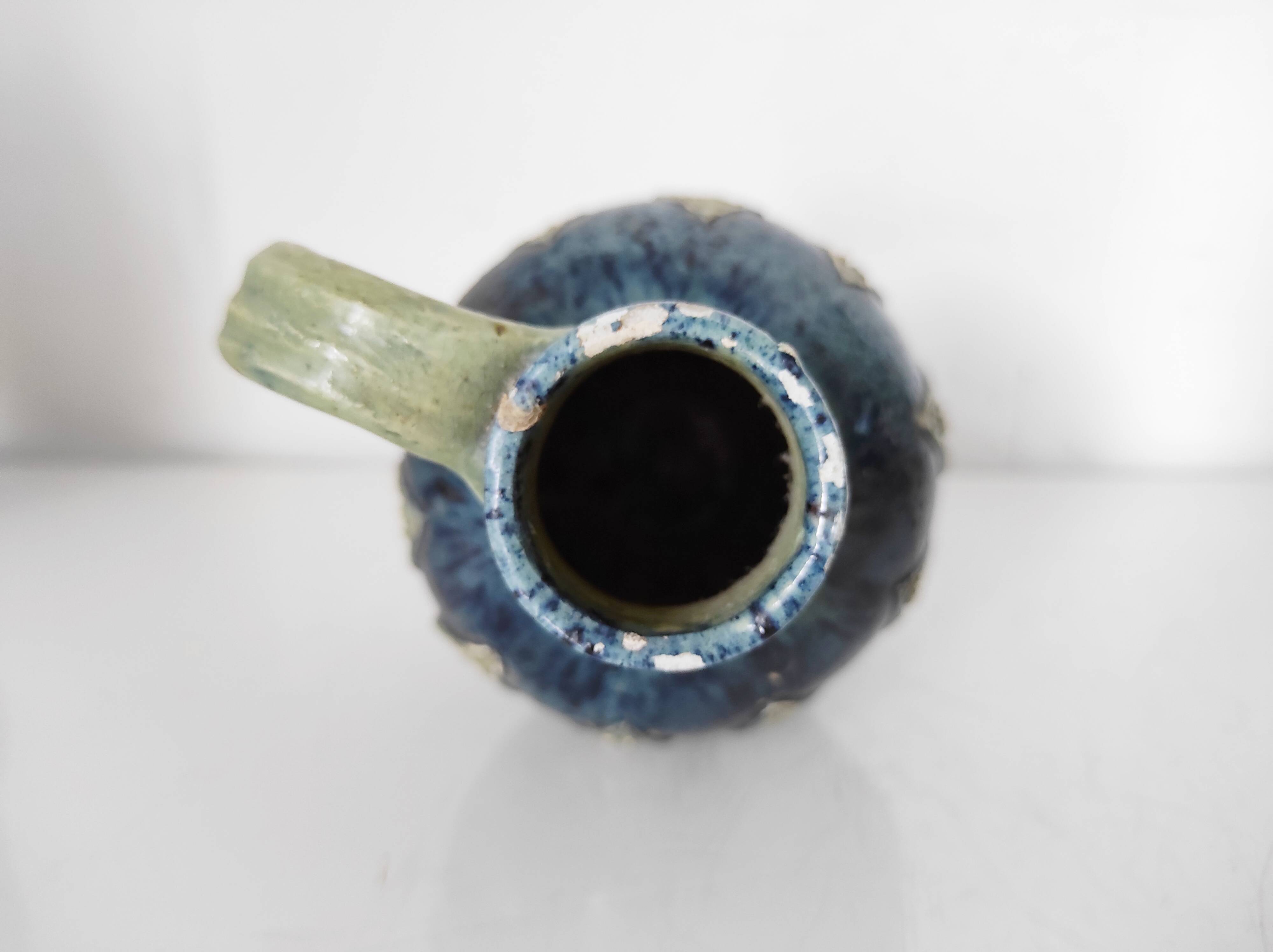 Two small blue ceramic vases