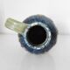 Two small blue ceramic vases