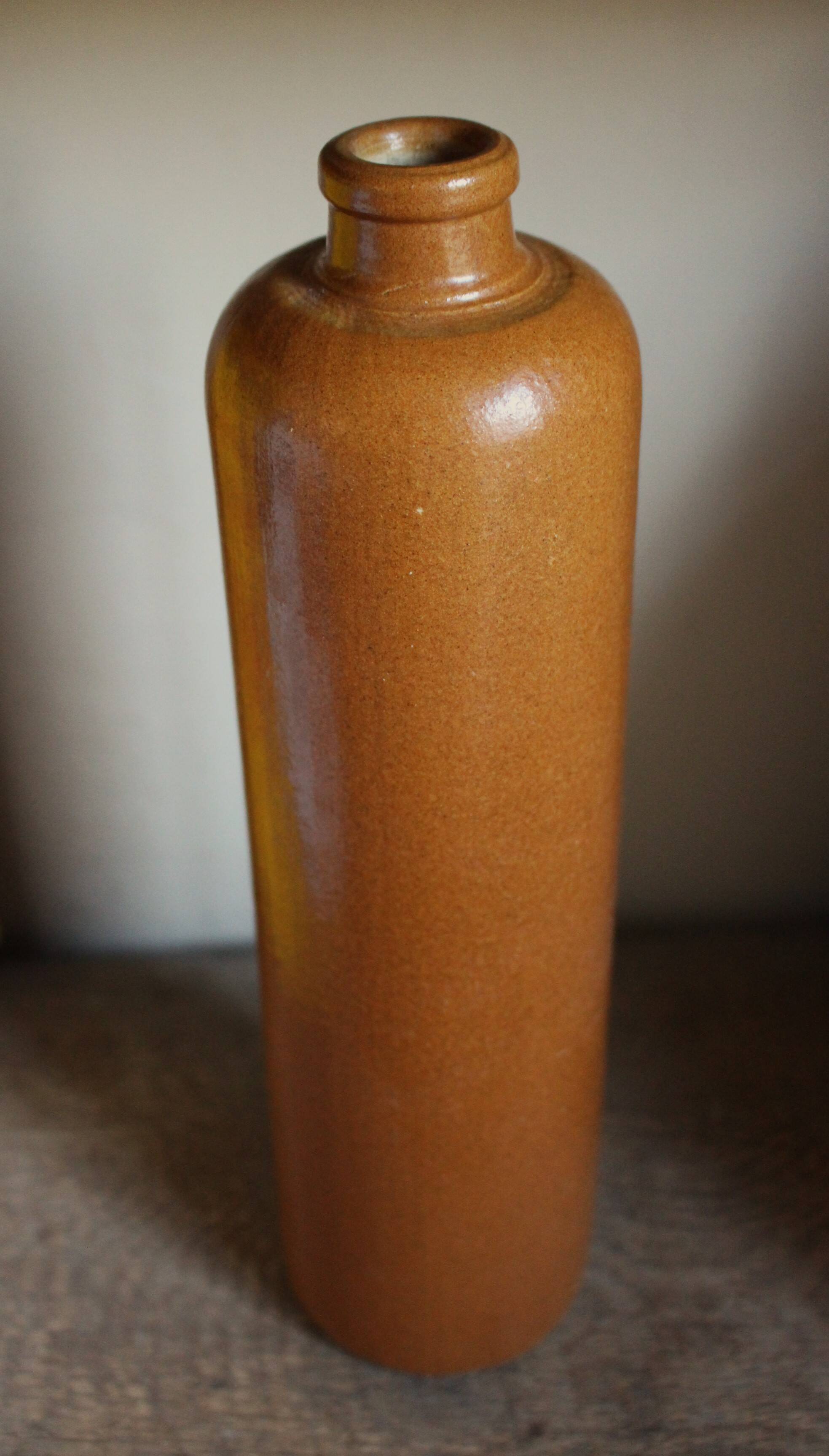 Large antique vintage stoneware liqueur bottle