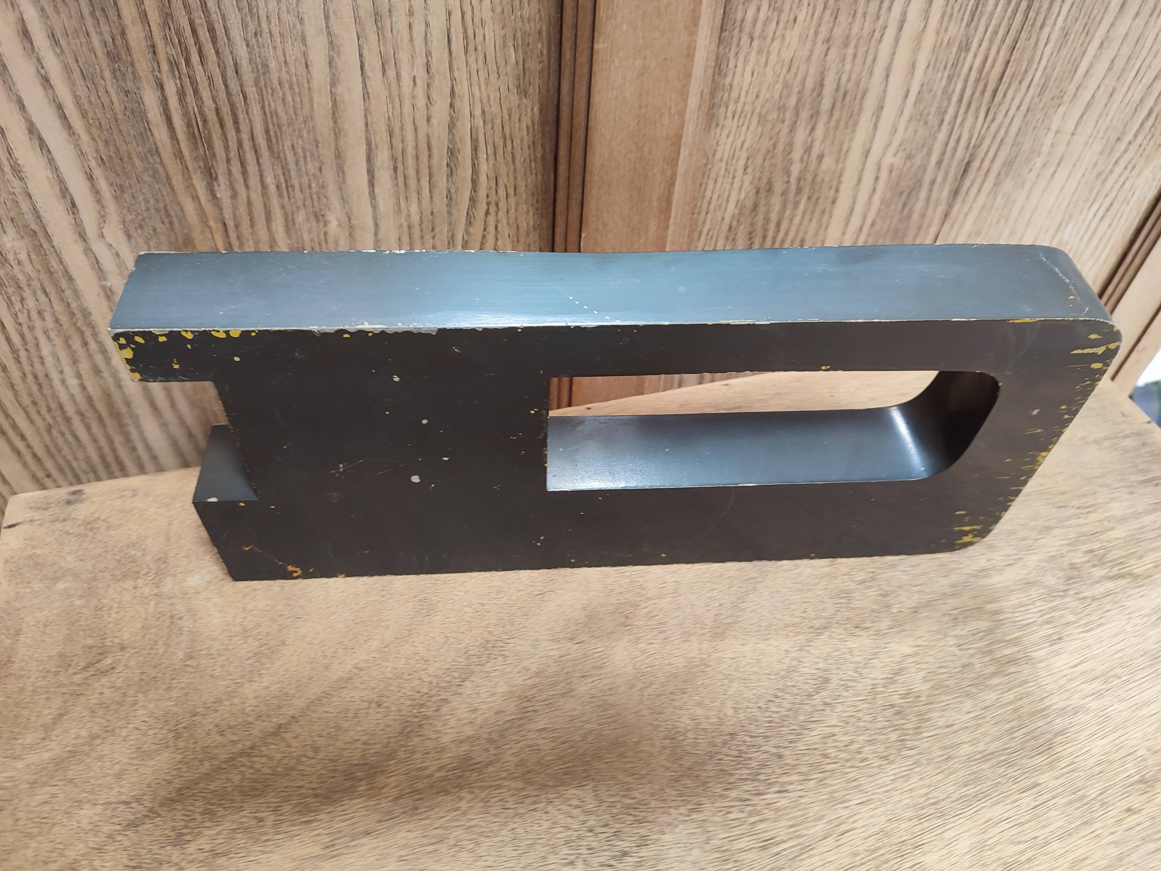 Vintage sign letter D