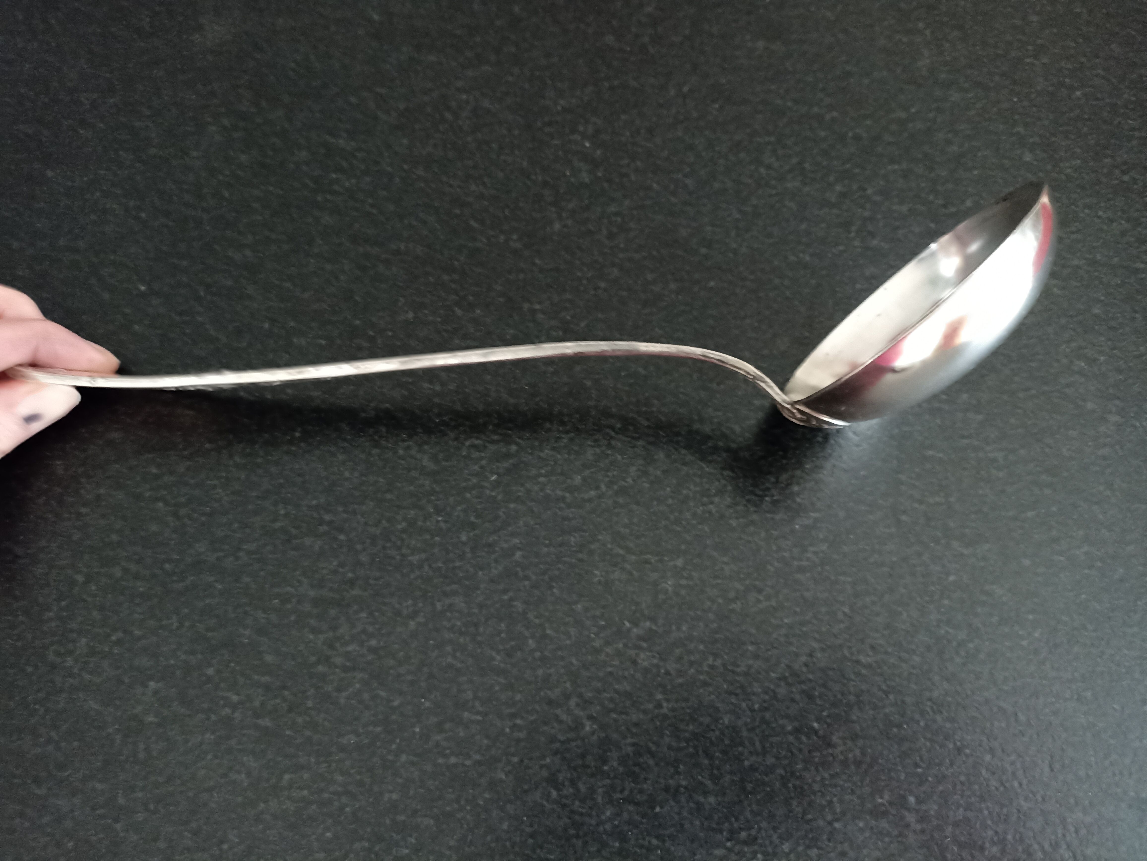 Silver metal ladle