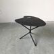 Side table in black lacquered metal, circa 1950.