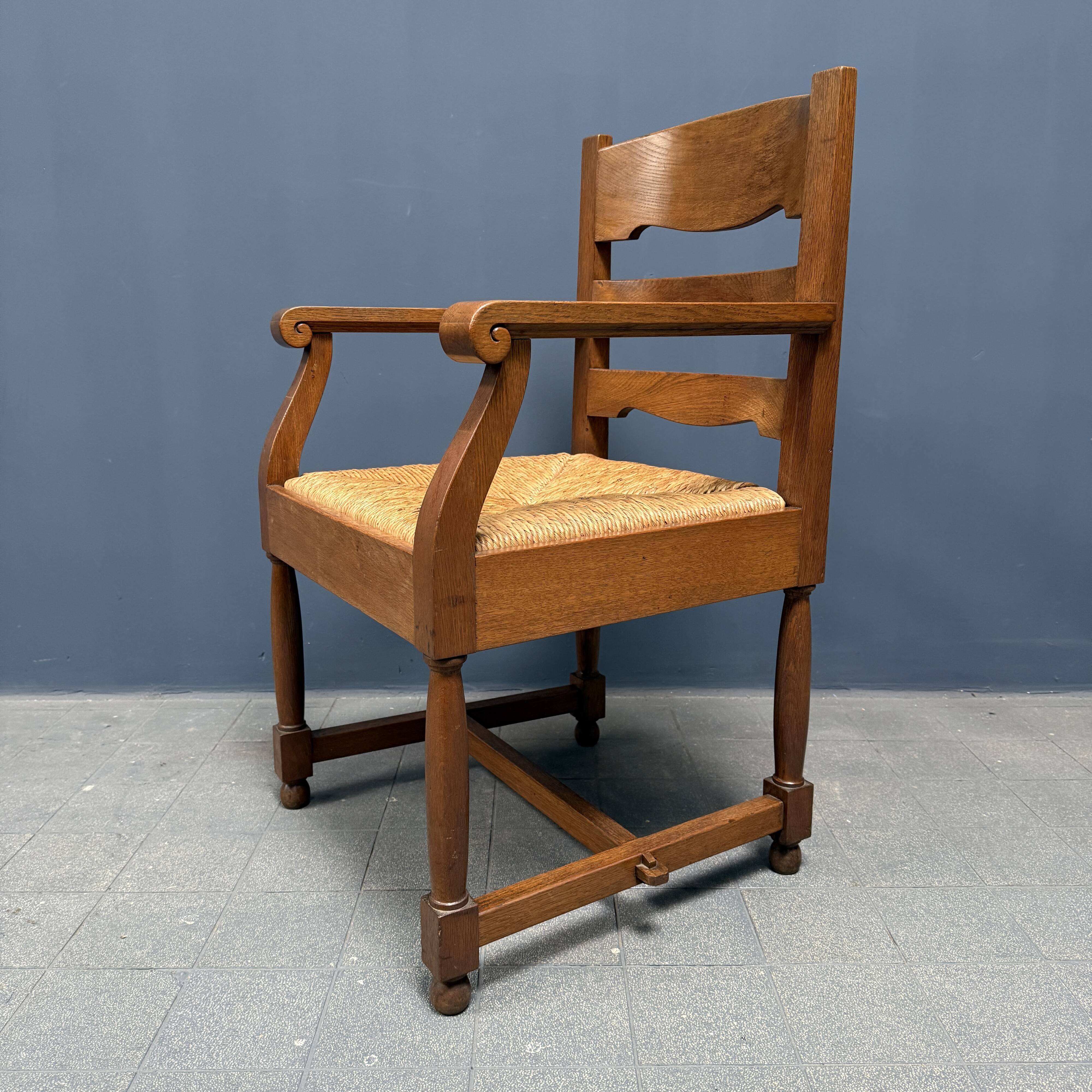 Set of two Dutch oak armchairs with rush seats