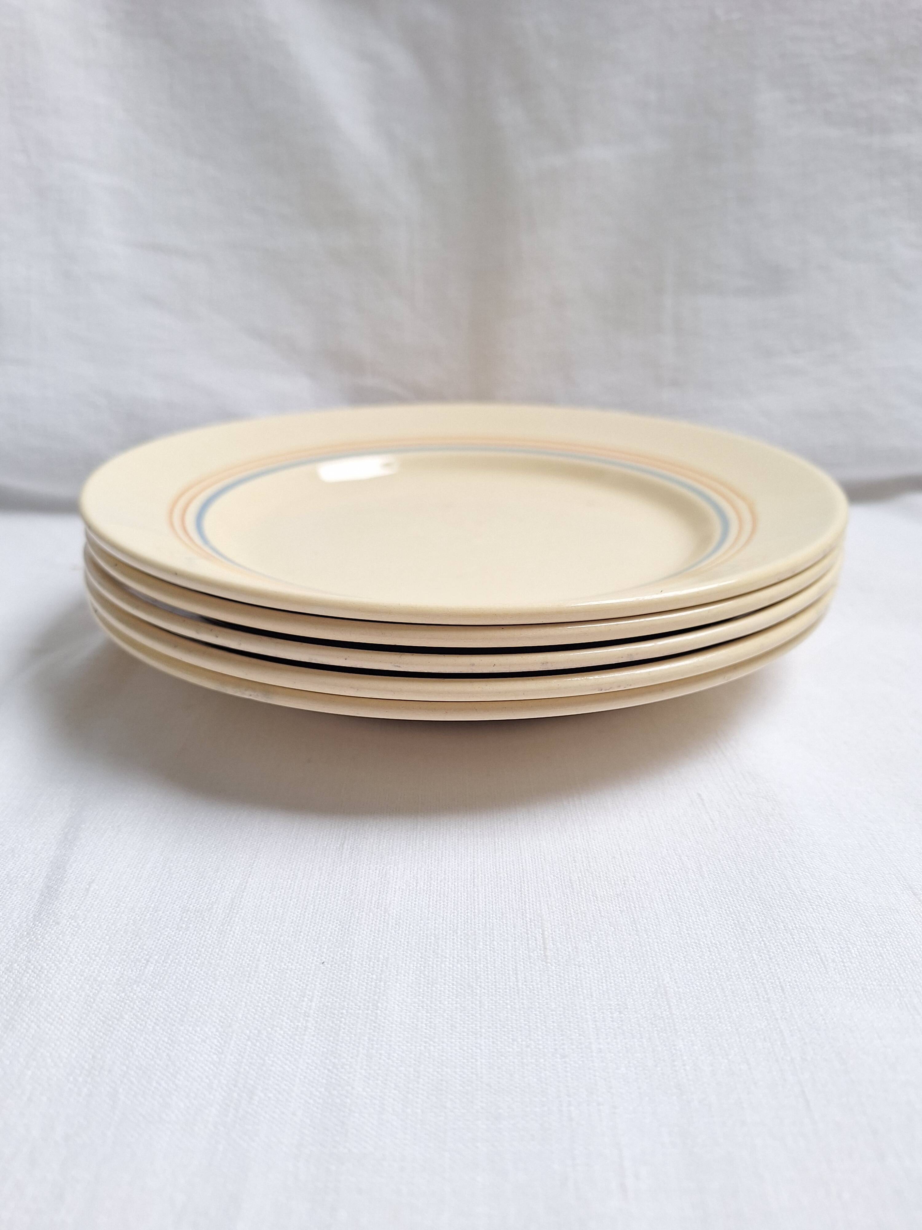 Vintage cream, orange and blue dinner plates.