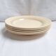 Vintage cream, orange and blue dinner plates.