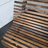 Old cast iron garden bench with oak slats