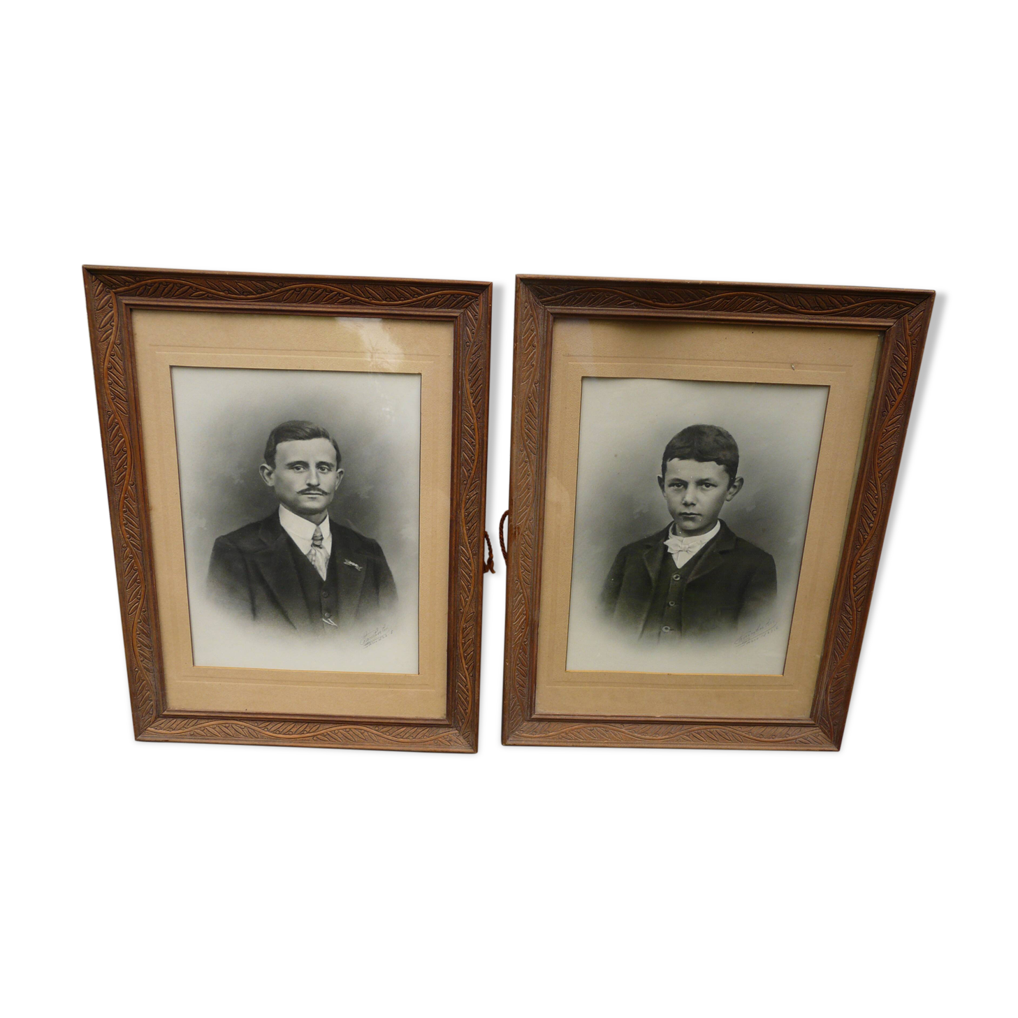 Pair of wooden frames with signed photos, 1923
