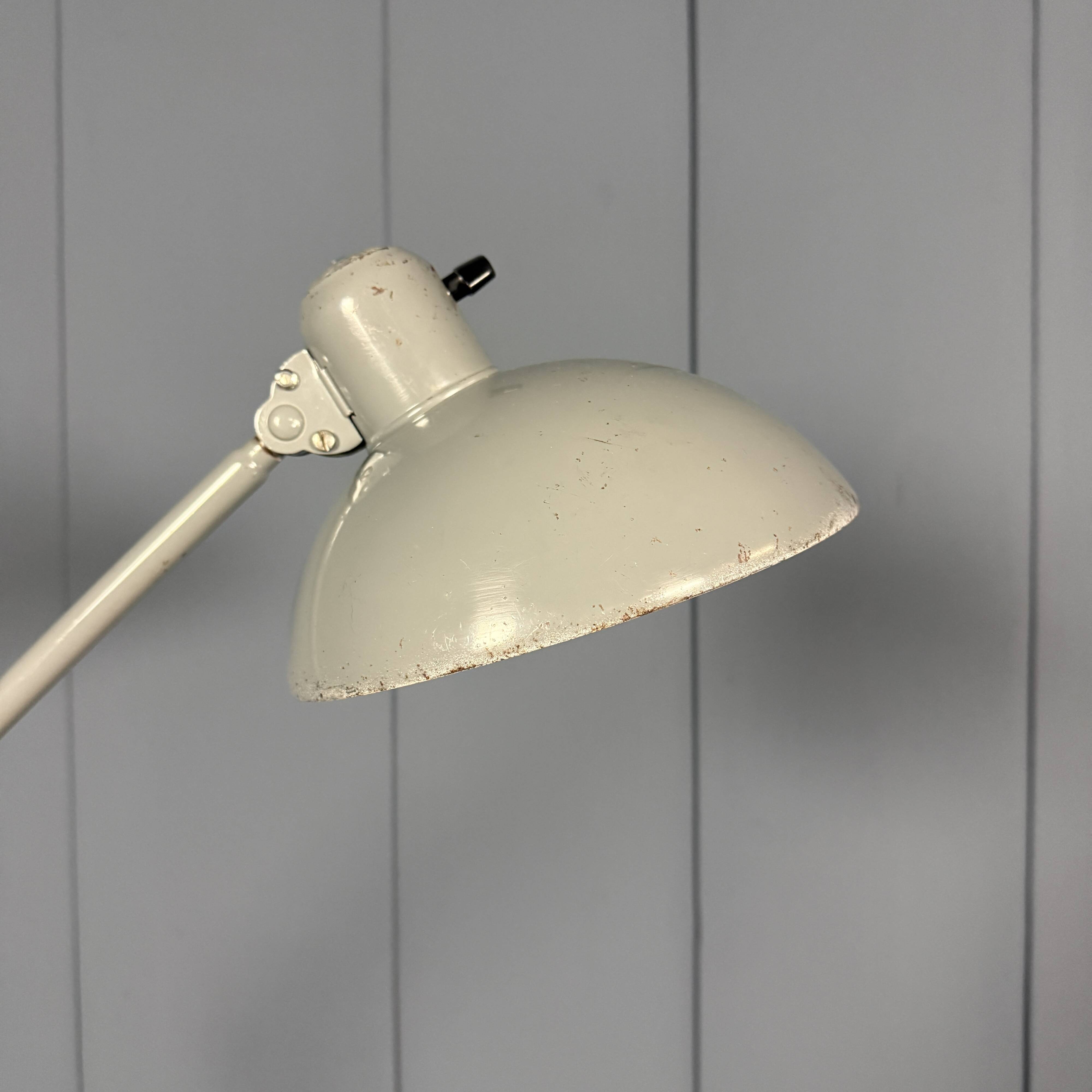Grey two-arm Kaiser Idell clamp lamp model