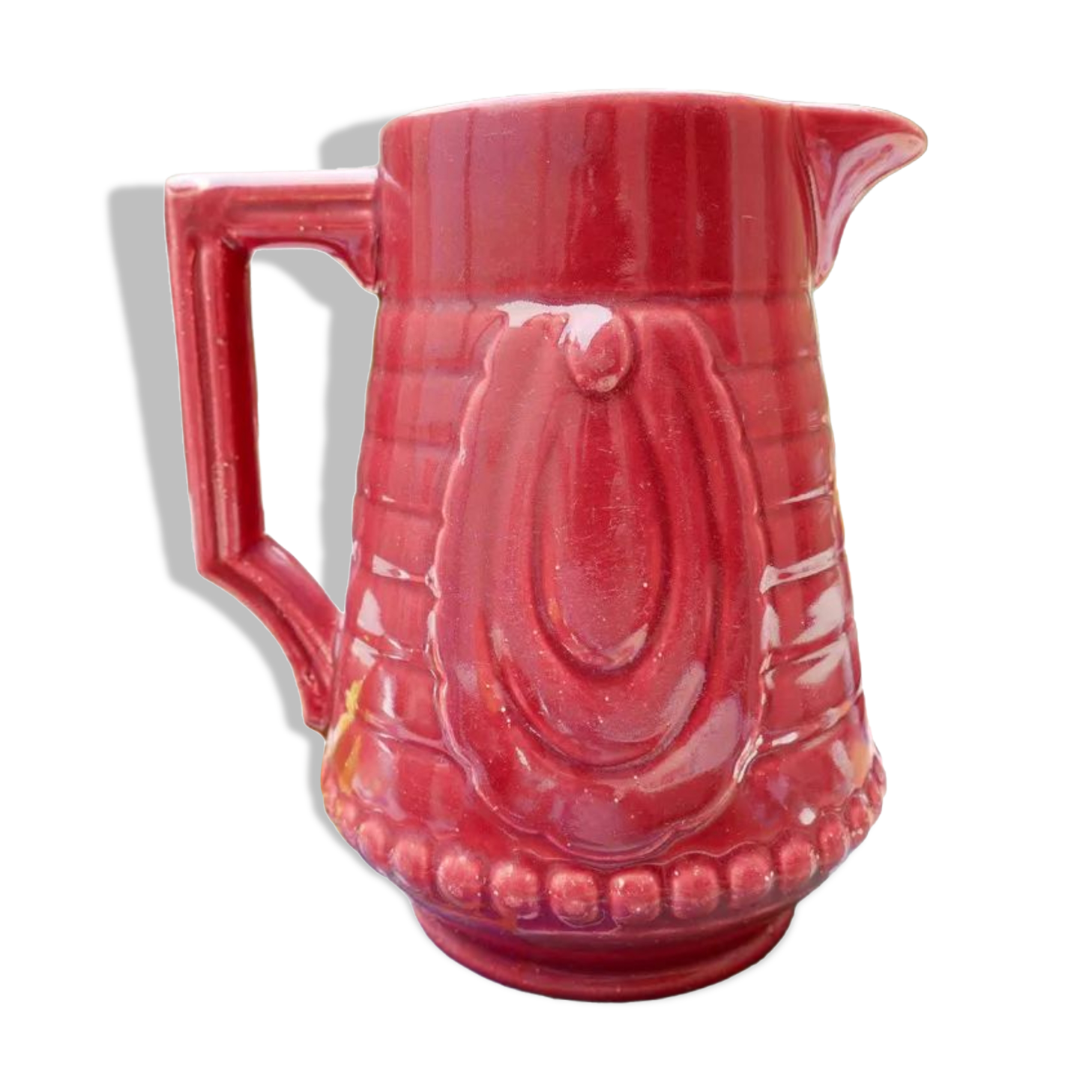 Burgundy/red ceramic pitcher