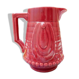 Burgundy/red ceramic pitcher