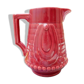 Burgundy/red ceramic pitcher