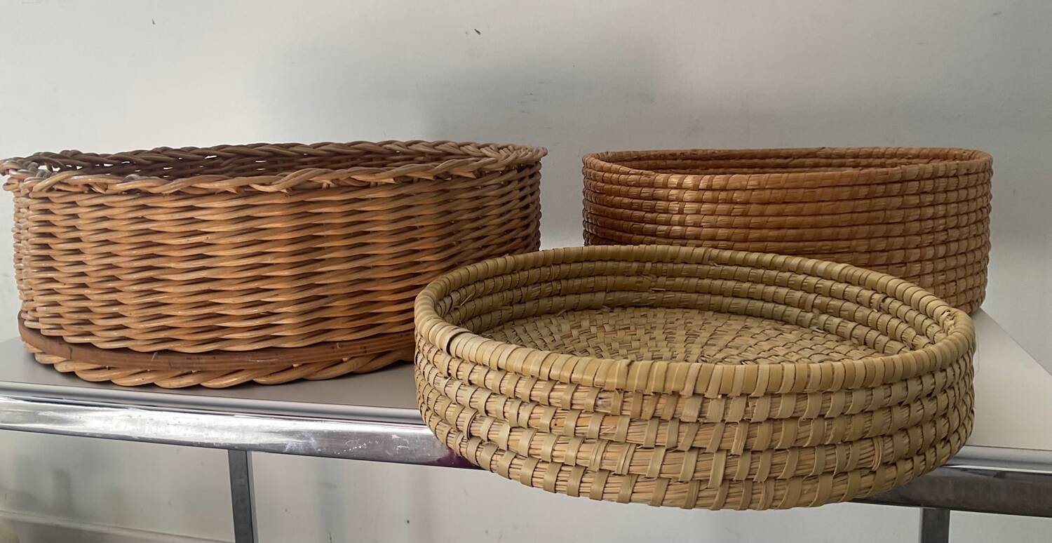 Trio of vintage wicker and woven raffia baskets