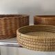 Trio of vintage wicker and woven raffia baskets