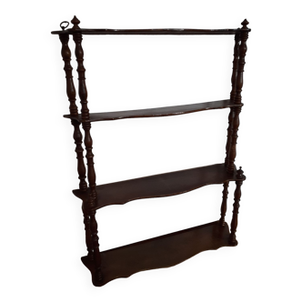 Turned wooden wall shelf