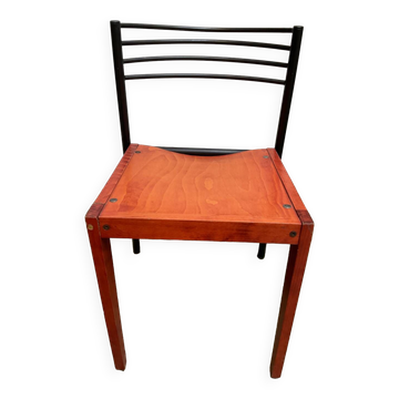 Chair with wooden seat and rare steel back