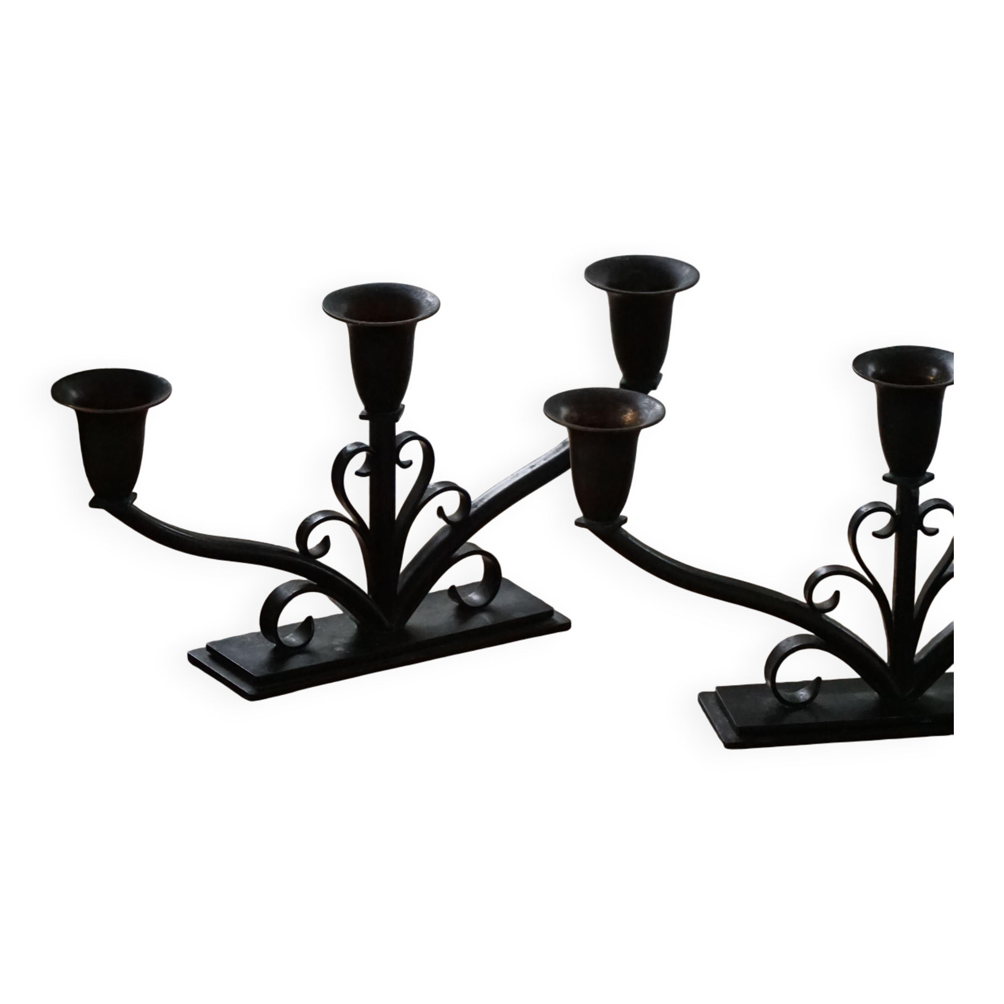Early 20th century, pair of Danish Art Deco candlesticks in metal with three arms, 1930s.