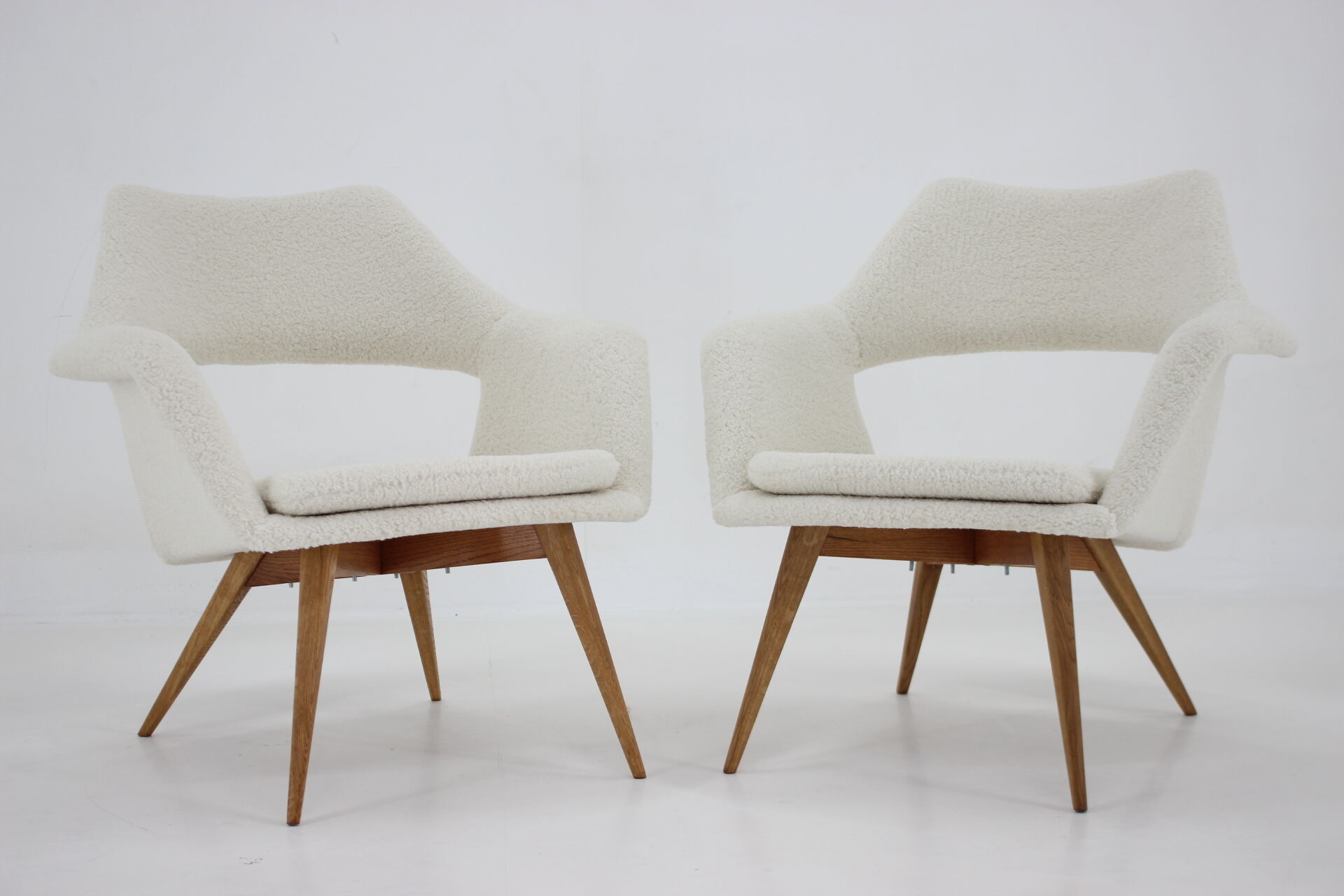 Pair of miroslav navratil shell lounge chairs in sheepskin fabric, czechoslovakia, 1960