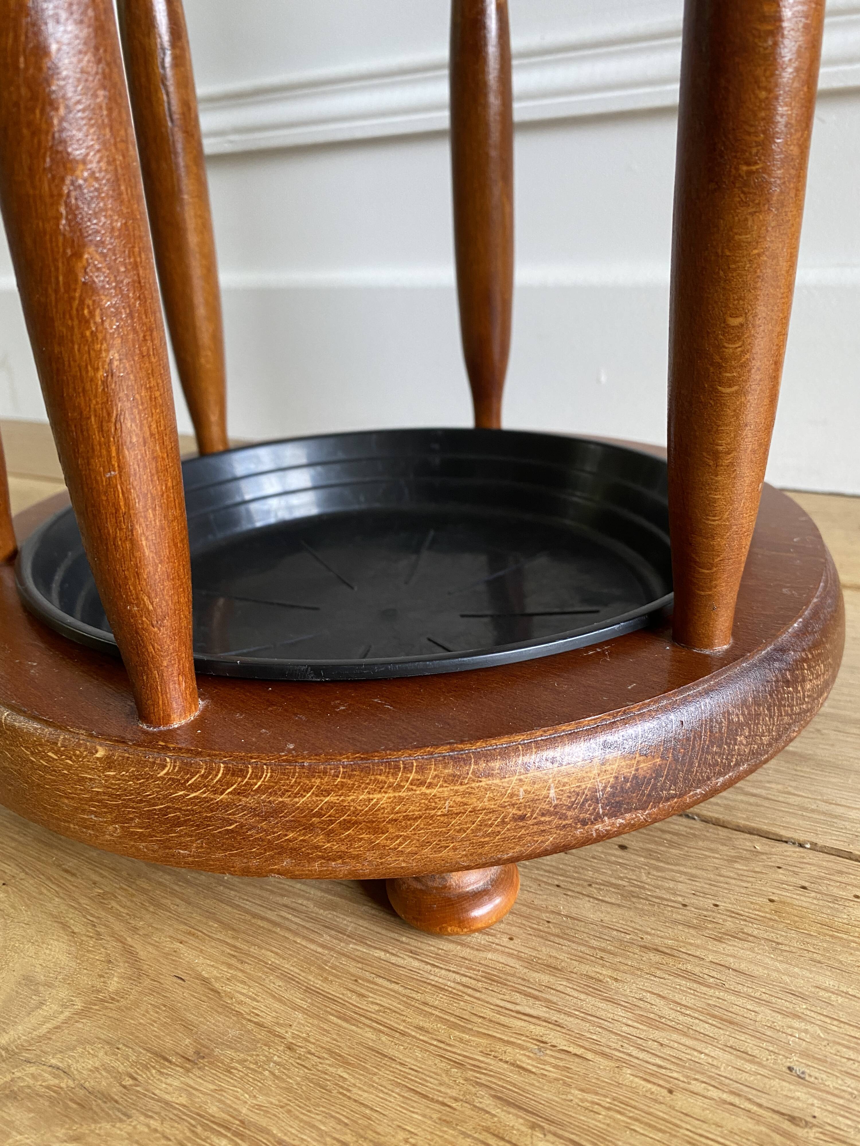 Vintage round wooden umbrella stand