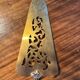 Silver cake server with gilded metal, pierced blade, 19th century.