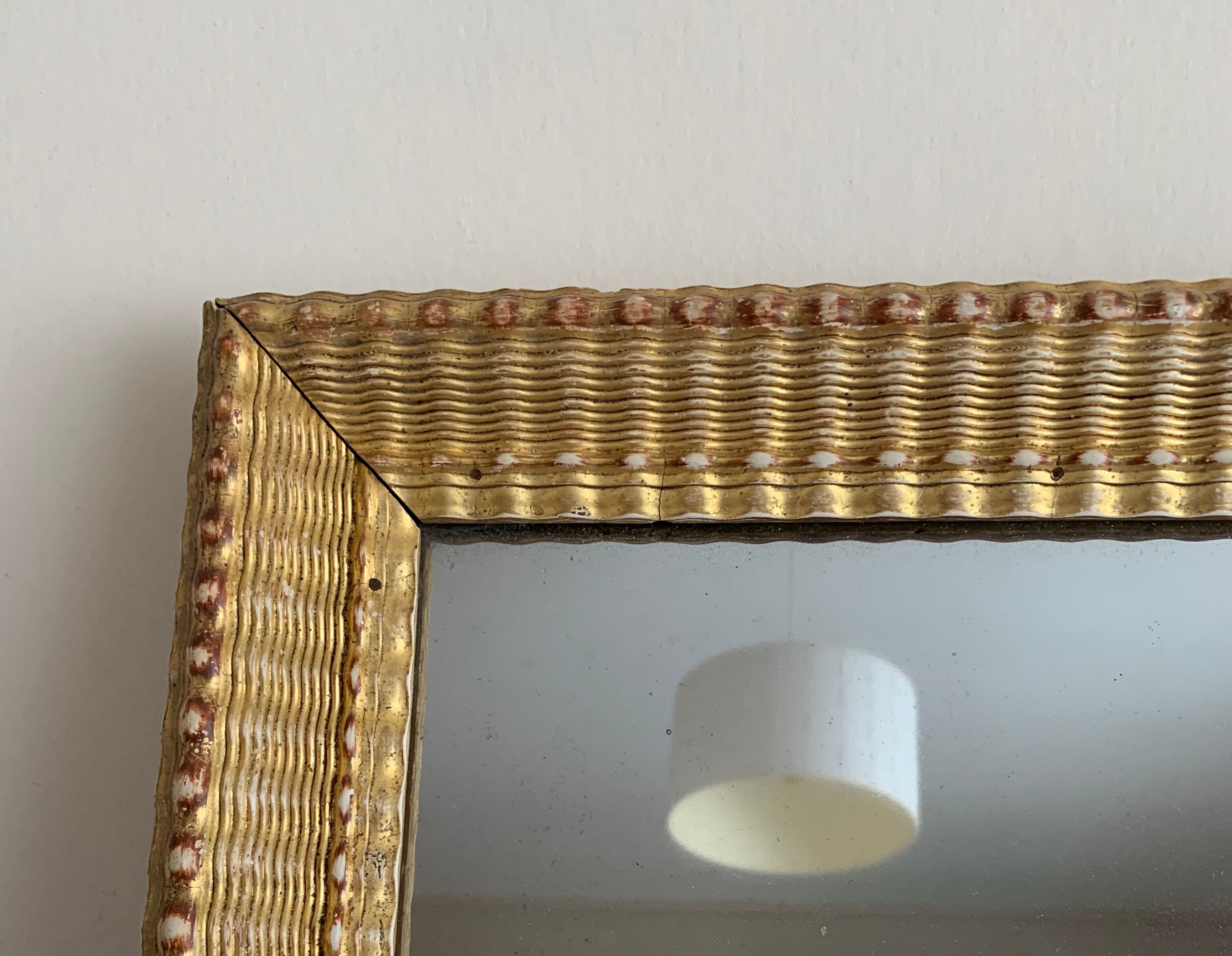 Carved and gilded wooden mirror  44x56cm