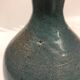 Light blue speckled ceramic vase